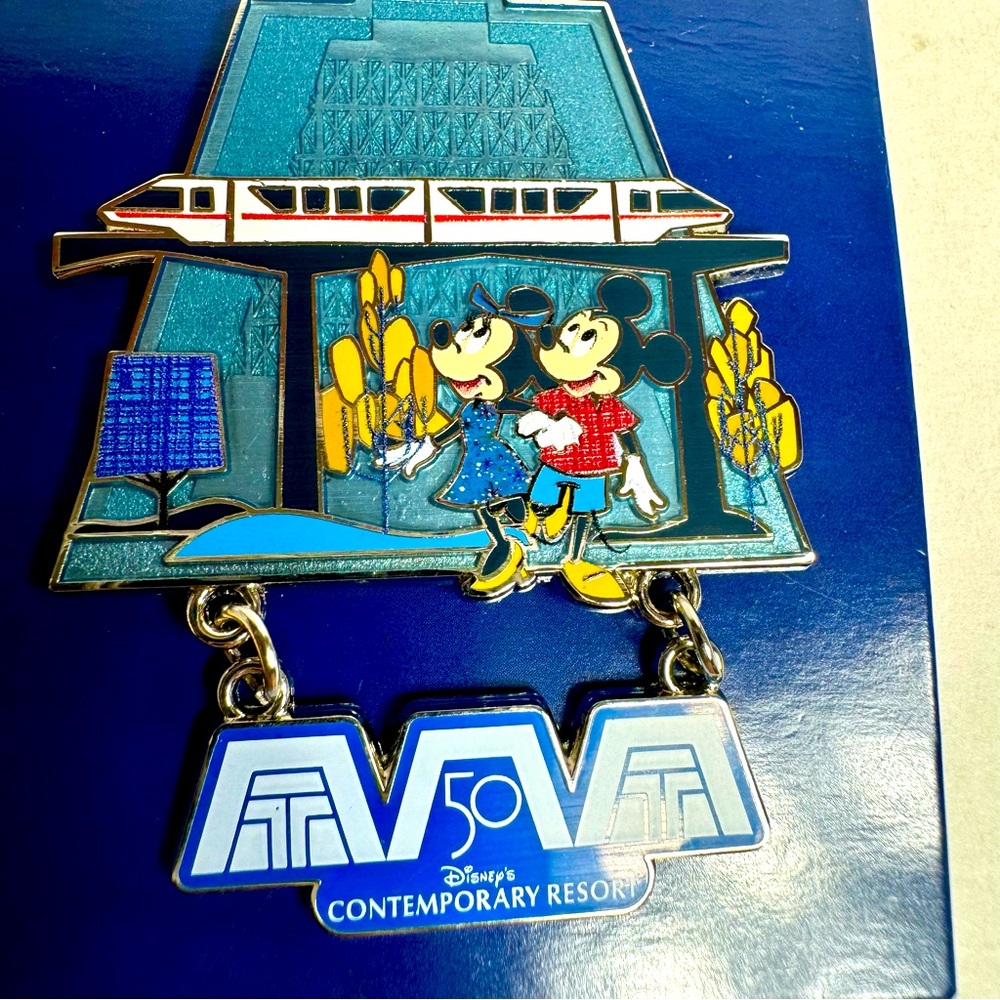 NWT. Disney pin trading. Contemporary resort pin with Mickey and Minnie Mouse